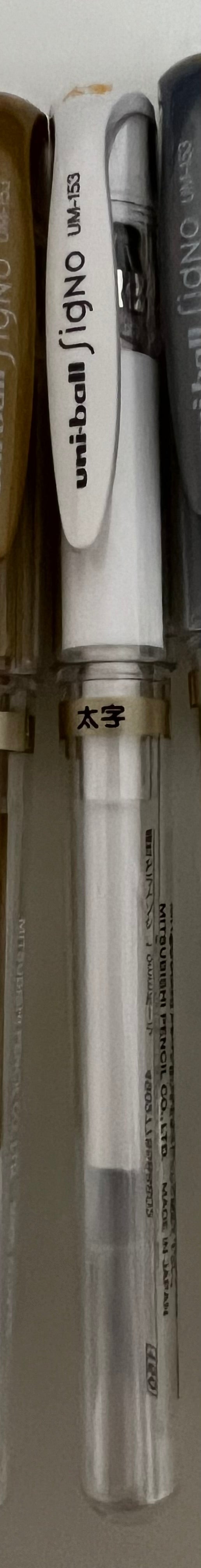 Uni-ball Signo white gel pen