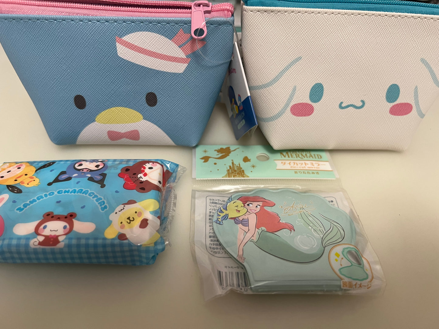 Tuxedosam / Cinnamoroll mini pouch with Ariel mirror & mini tissue set