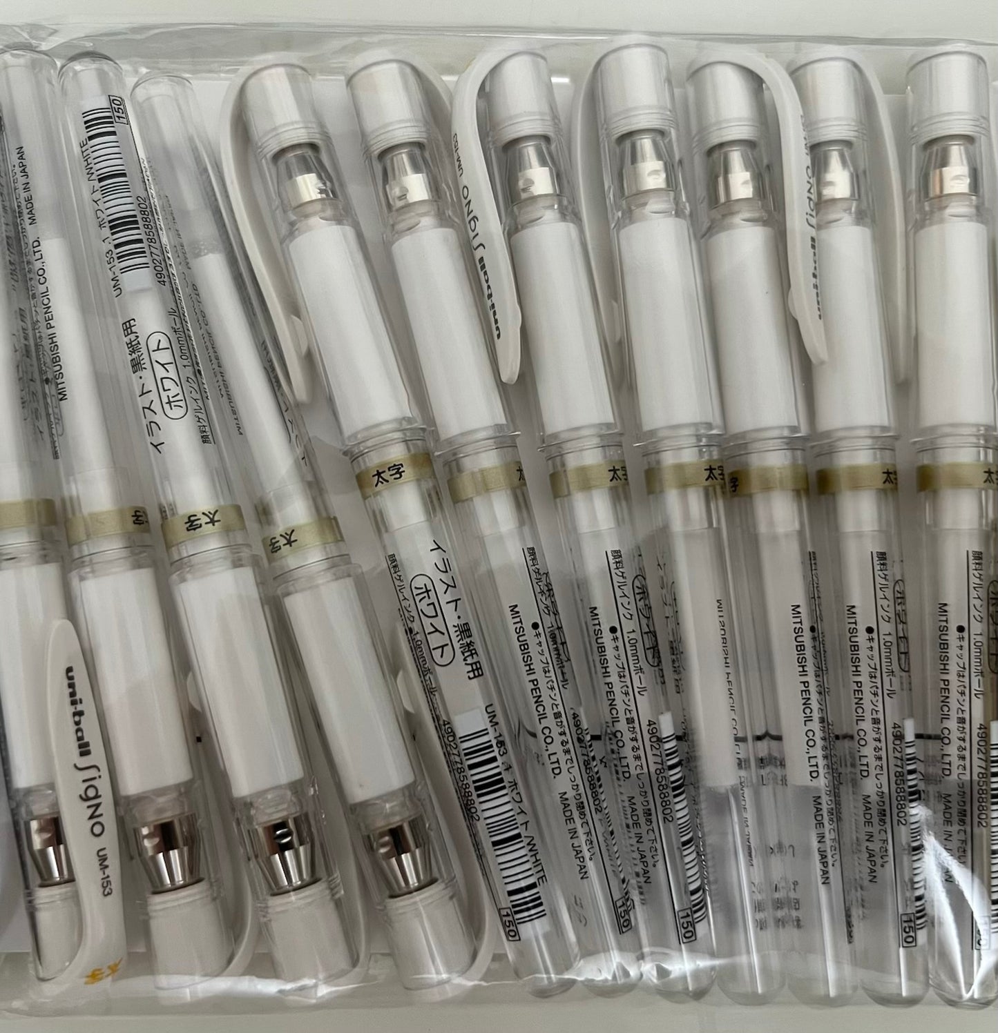 Uni-ball Signo white gel pen