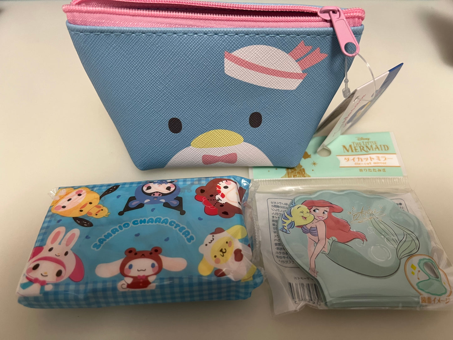 Tuxedosam / Cinnamoroll mini pouch with Ariel mirror & mini tissue set